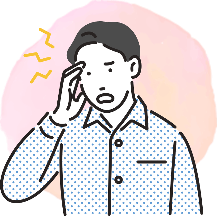 こめかみをおさえる男性